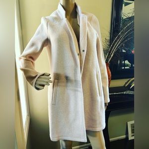 Light pink brand new no tags, size med soft light coat